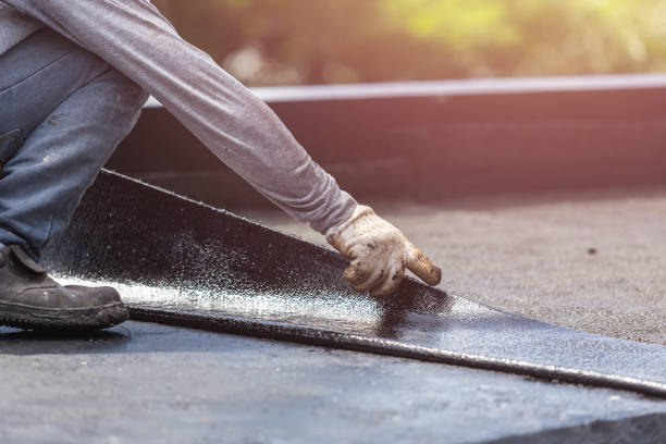 Professional Basement Waterproofing technician working in Portage, WI